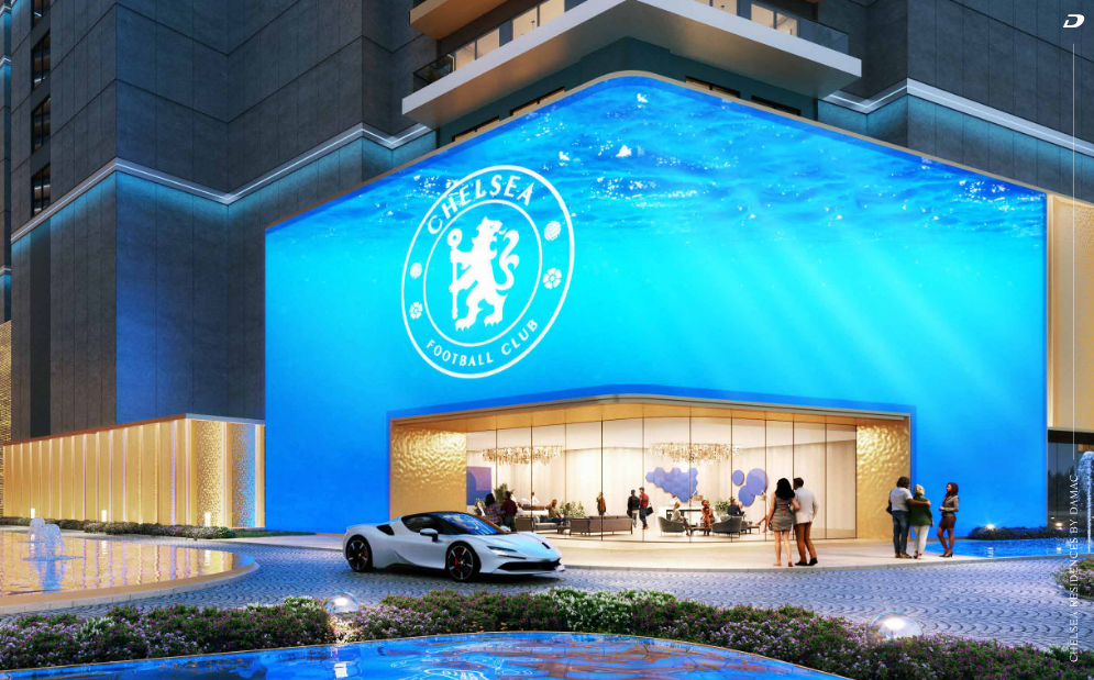 Chelsea branded entrance lobby with blue LED facade and luxury car